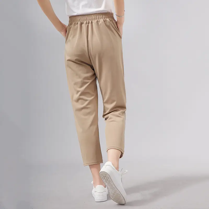 Women Cropped Pants with Metal Embellishments Solid Color - Image 6