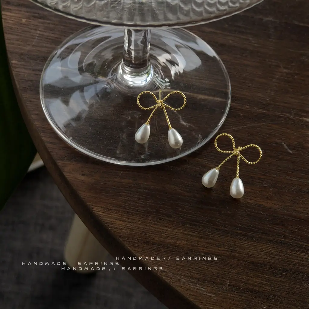 925 Silver Bow Earrings with Pearl Drop - Image 4