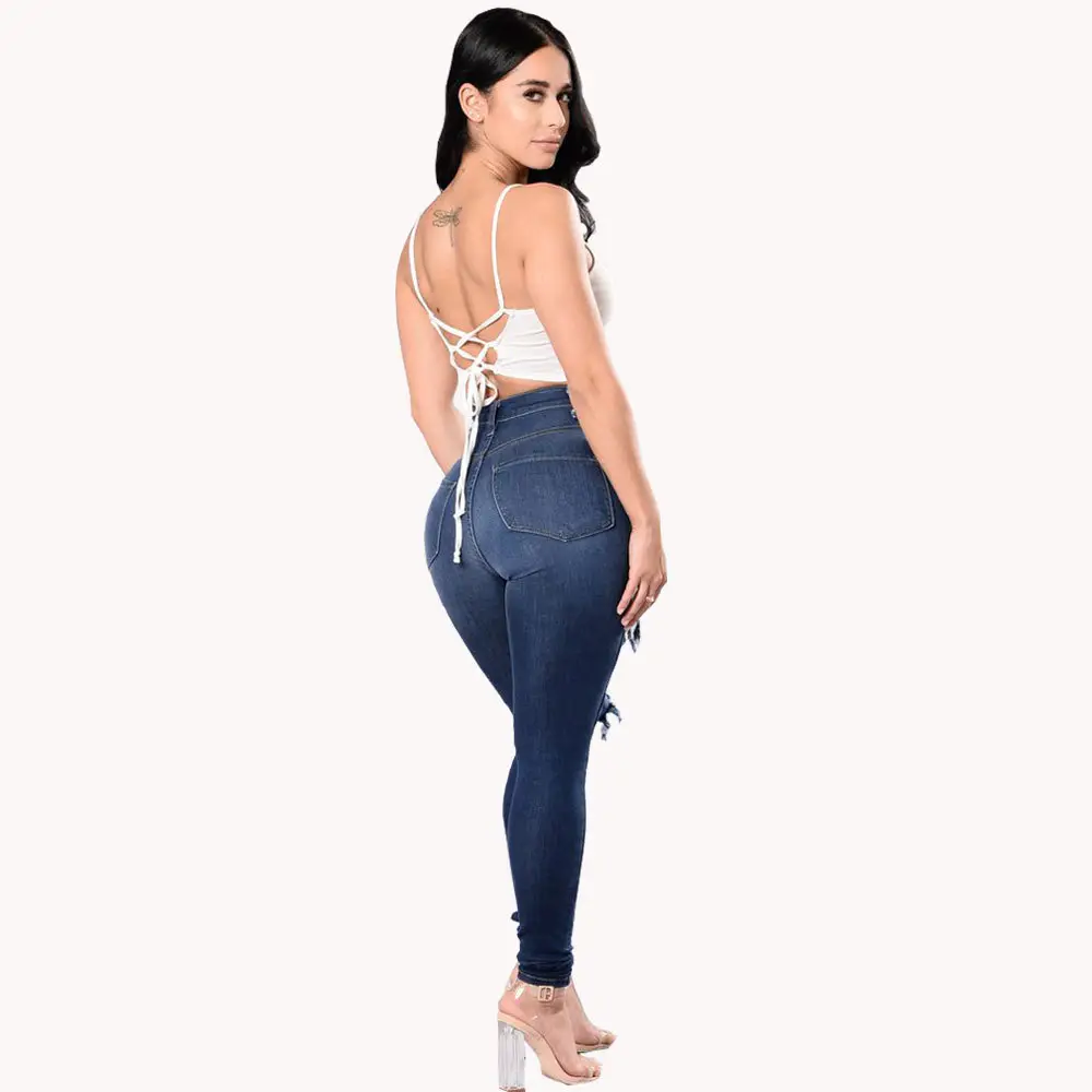 Women Ripped Black Leggings with White Top — feature 4