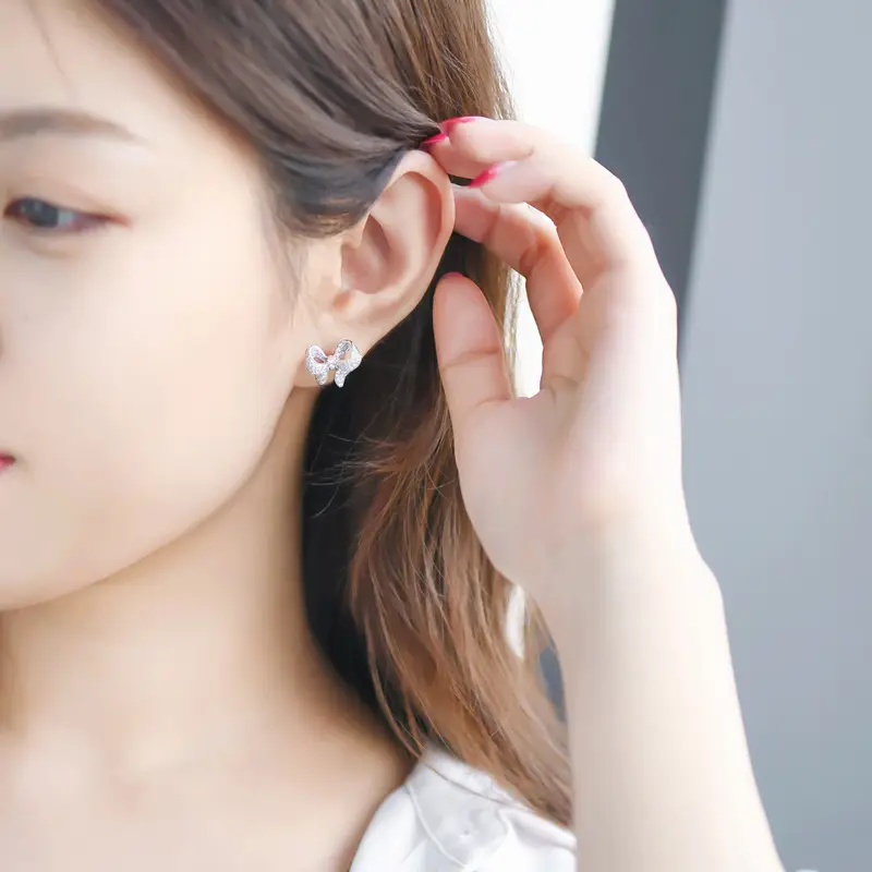 Golden Bow Micro-Encrusted Zircon Commuter Earrings for Women - Image 8