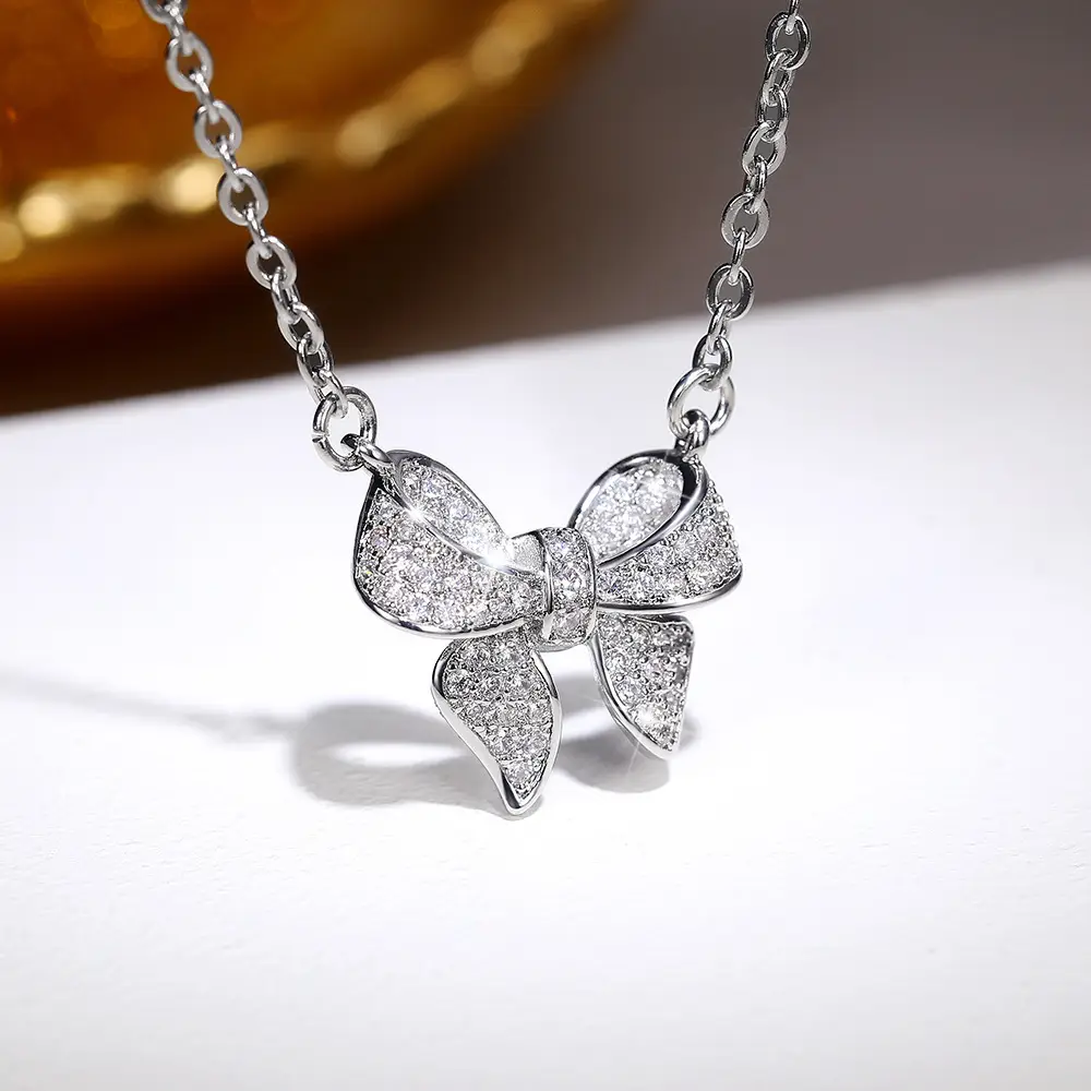 Golden Bow Micro-Encrusted Zircon Commuter Earrings for Women - Image 2