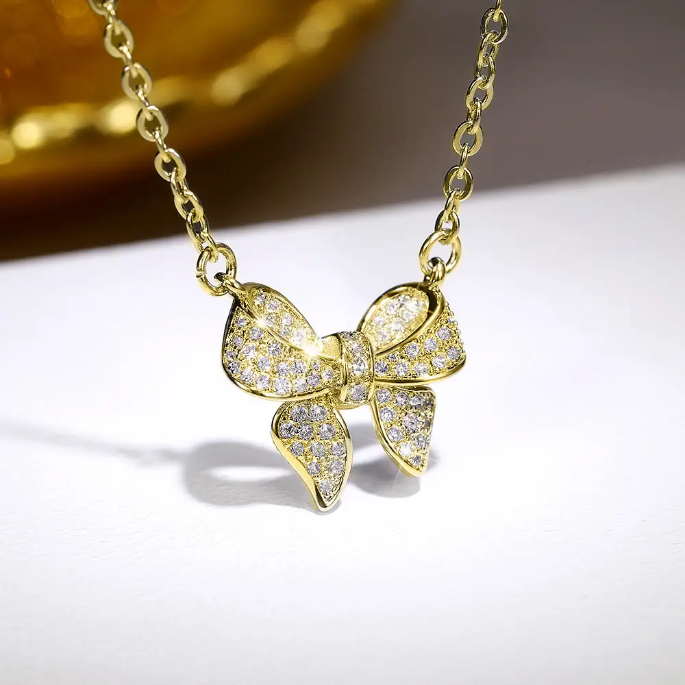 Golden Bow Micro-Encrusted Zircon Commuter Earrings for Women - Image 4