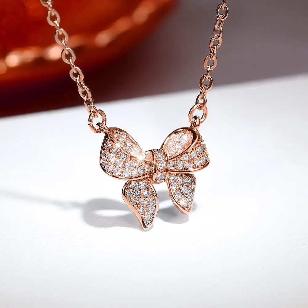Golden Bow Micro-Encrusted Zircon Commuter Earrings for Women - Image 6