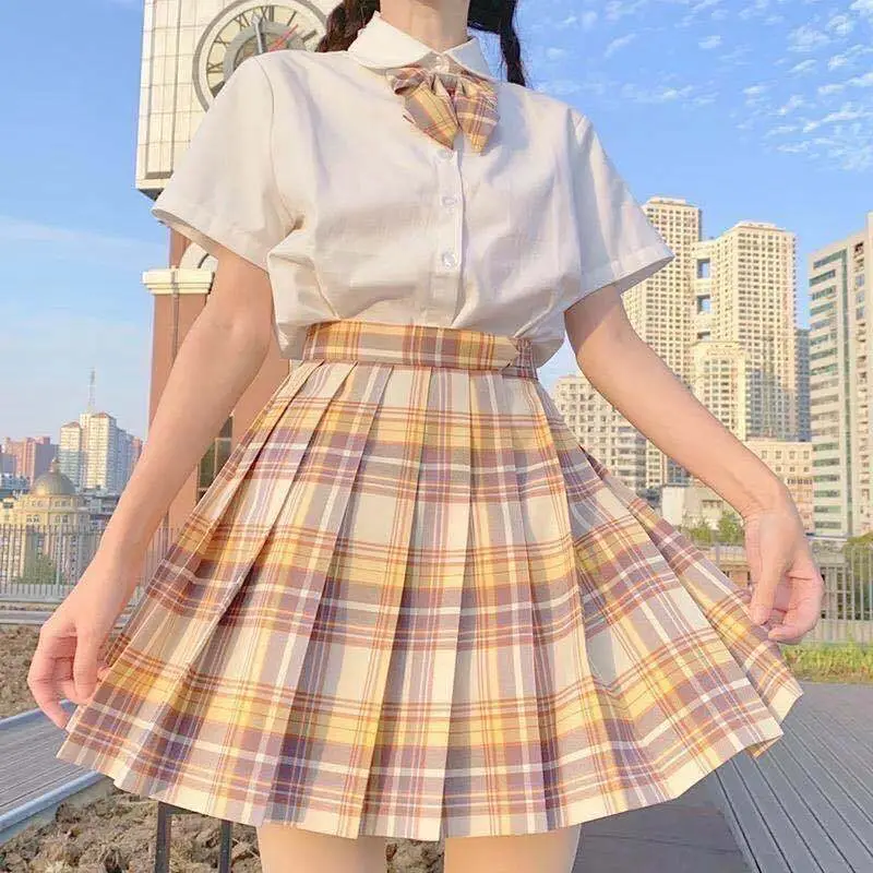Mountain blow lattice skirt + white short sleeve + bow tie