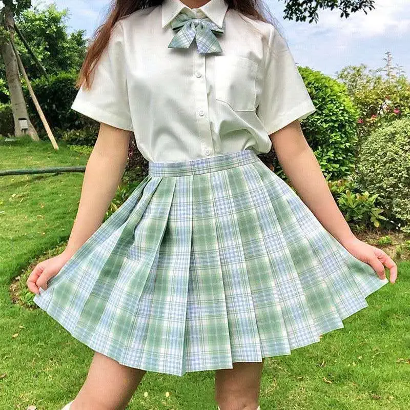 Cedar plaid skirt + white short sleeve + bow tie
