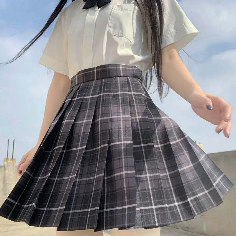 Soot plaid skirt + white short sleeve + bow tie