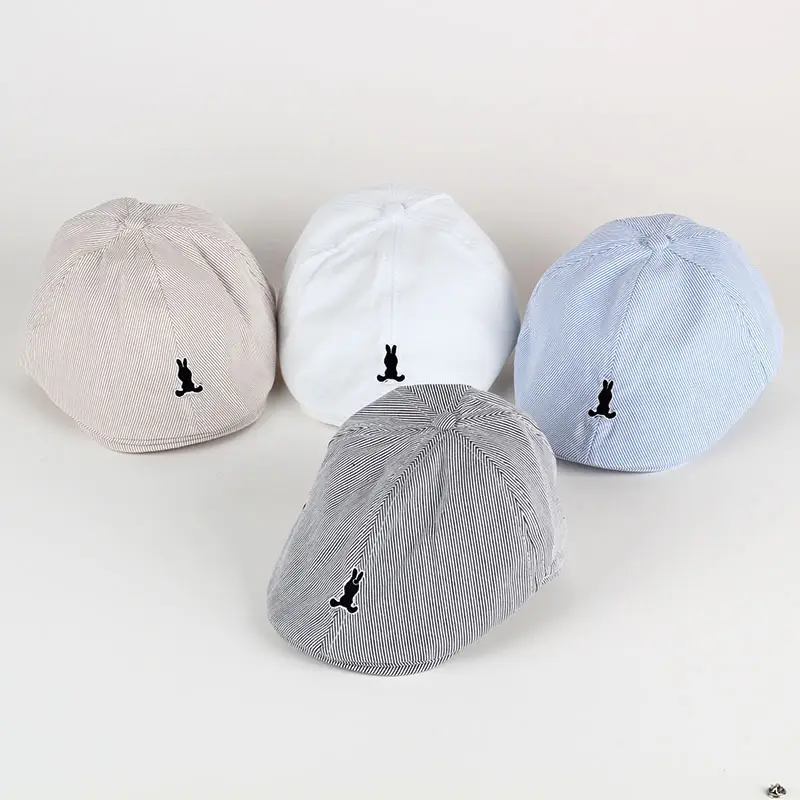 Light Blue Striped Baby Cap with Embroidered Bird Design — feature 1