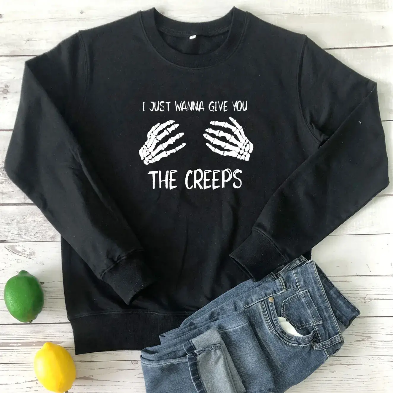 Orange Halloween Creeps Handprint Sweater with Jeans