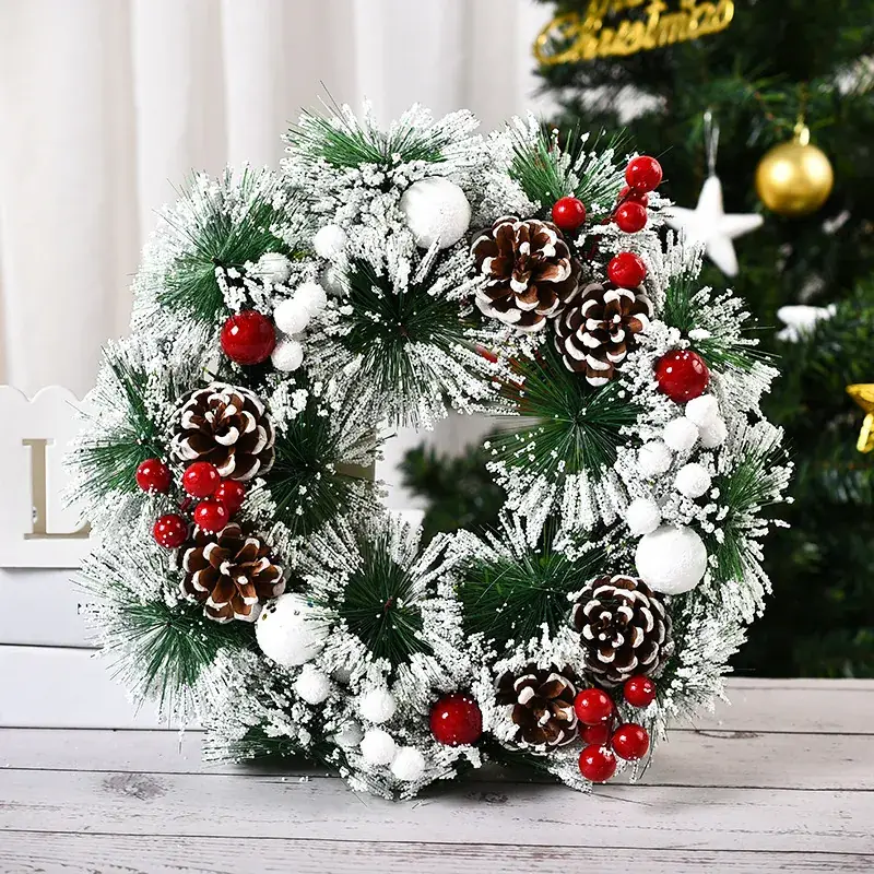 Christmas Wreath Decorated with Pinecones and Red Berries