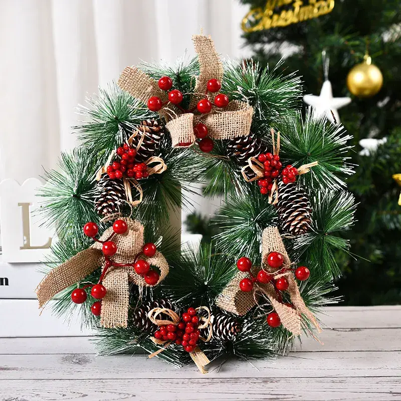 Christmas Wreath Decorated with Pinecones and Red Berries