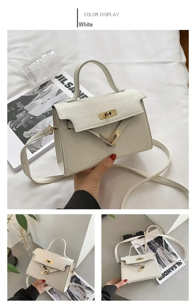 White bag shown from the front with top handle and shoulder strap