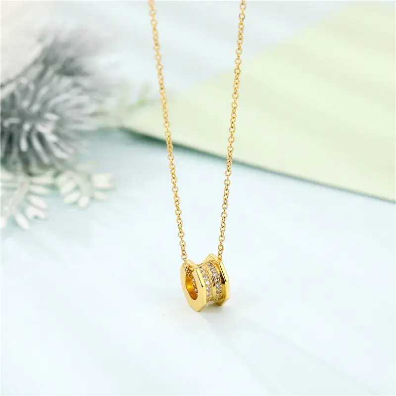 Gold Titanium Necklace for Women with Little Red Riding Book Design - Image 3