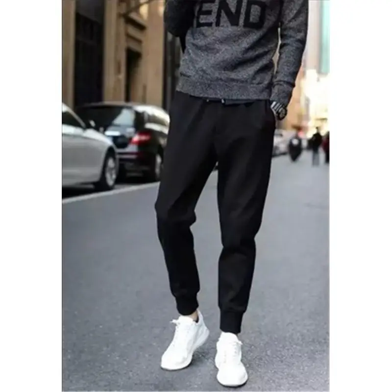 Men's Black Slim Fit Sports Pants with White Sneakers - Image 2