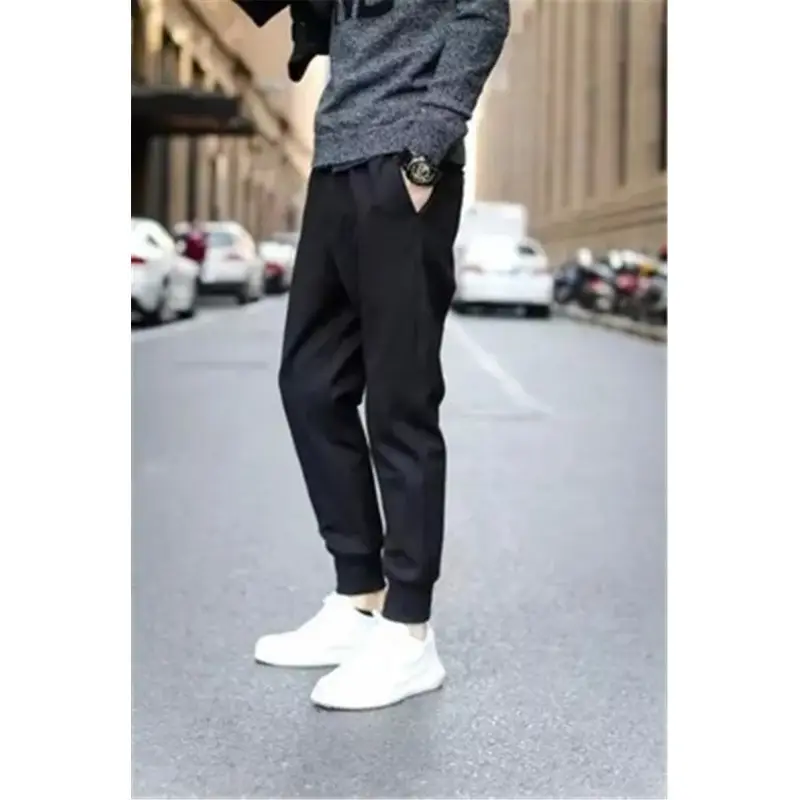Men's Black Slim Fit Sports Pants with White Sneakers - Image 5