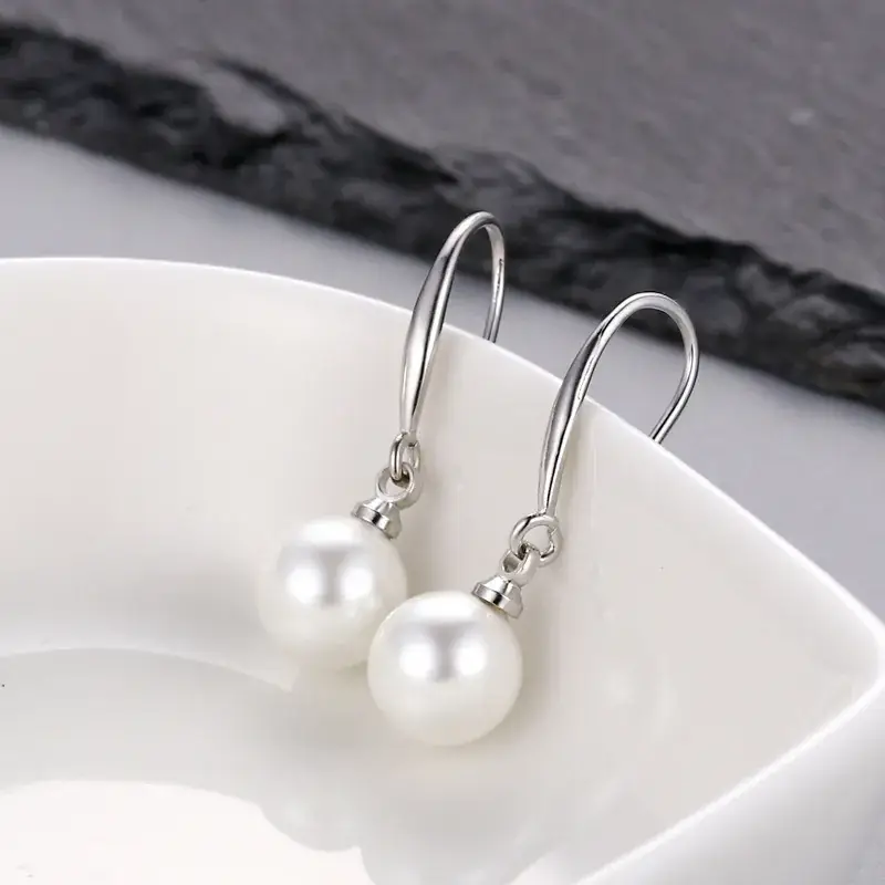 Gold Pearl Dangle Earrings for Women - Image 6