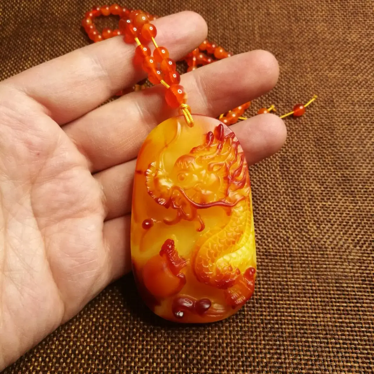 Beeswax Dragon Pendant Necklace Yellow Amber — feature 1