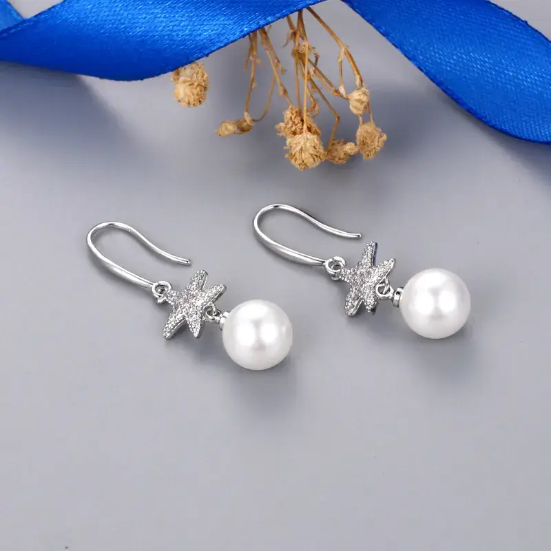 Gold Starfish Pearl Earrings for Women - Image 8