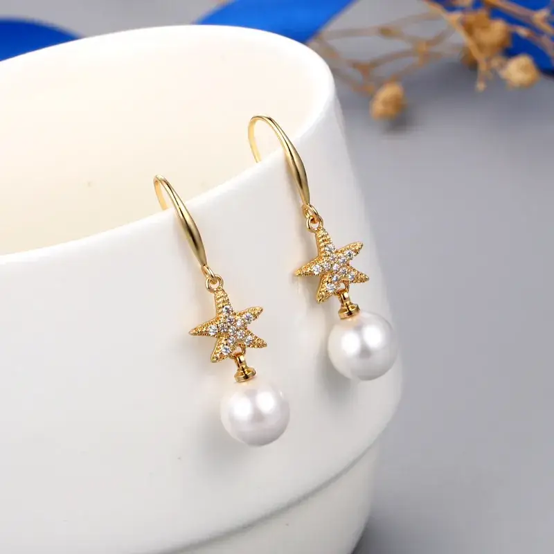 Gold Starfish Pearl Earrings for Women - Image 2