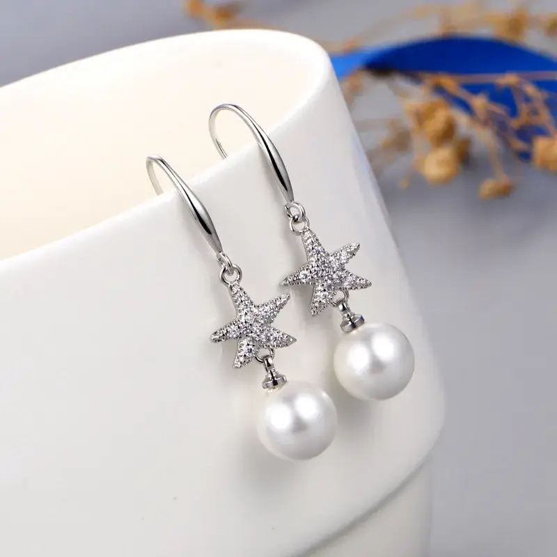 Gold Starfish Pearl Earrings for Women - Image 3