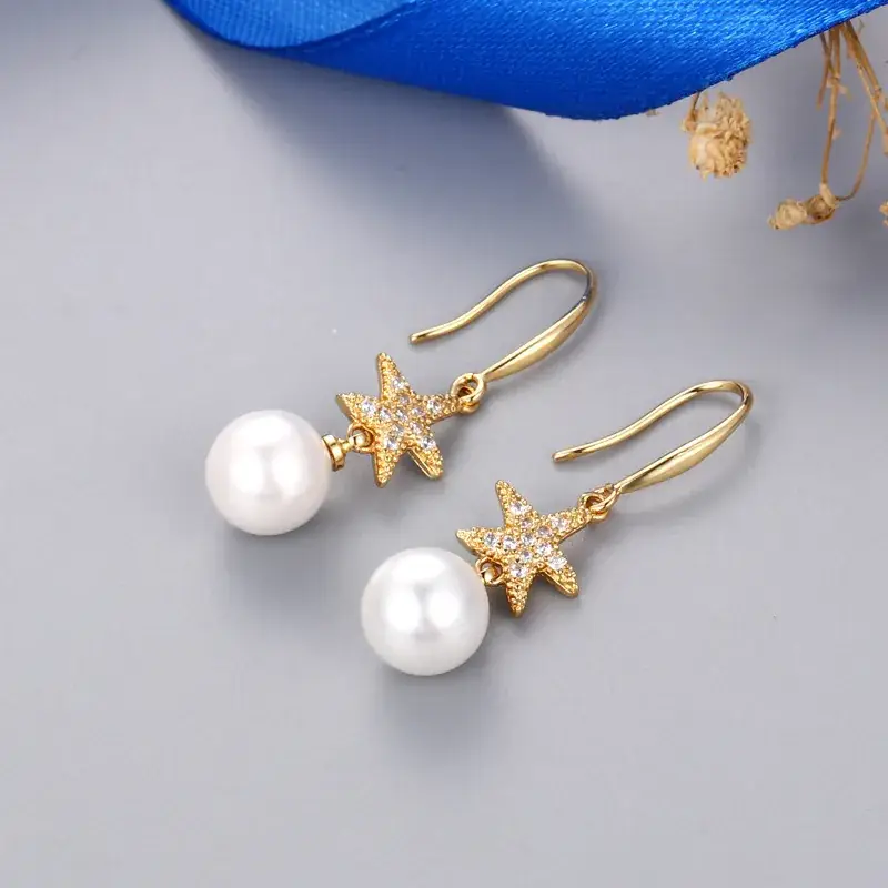 Gold Starfish Pearl Earrings for Women - Image 4