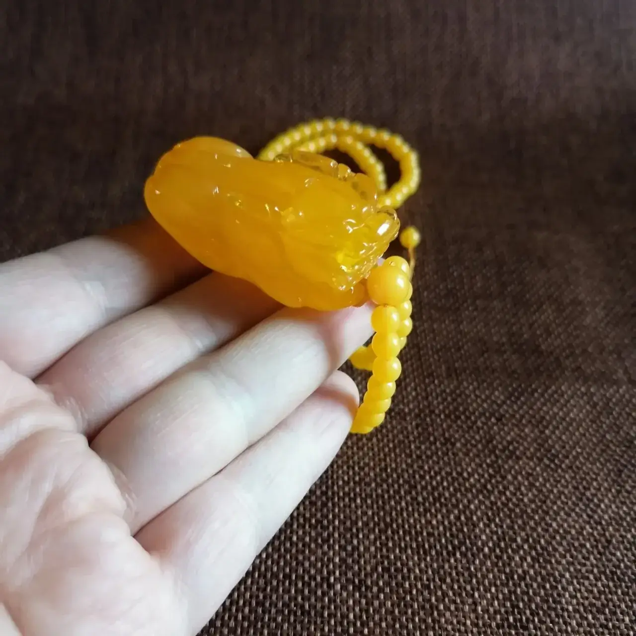Beeswax Pixiu Pendant Yellow Woolen Chain Necklace — feature 1