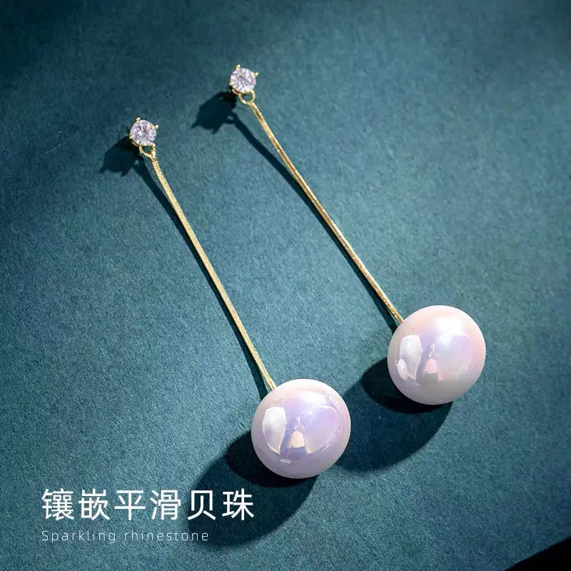 Long Tassel Pearl Earrings with Diamond Top - Image 8