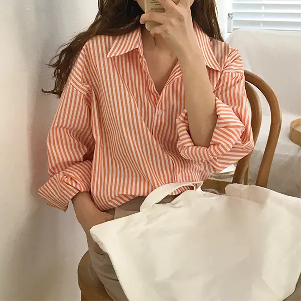 Elegant Striped Shirt with Loose Collar & White Tulle Bag - Image 3