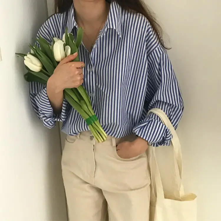 Elegant Striped Shirt with Loose Collar & White Tulle Bag - Image 4