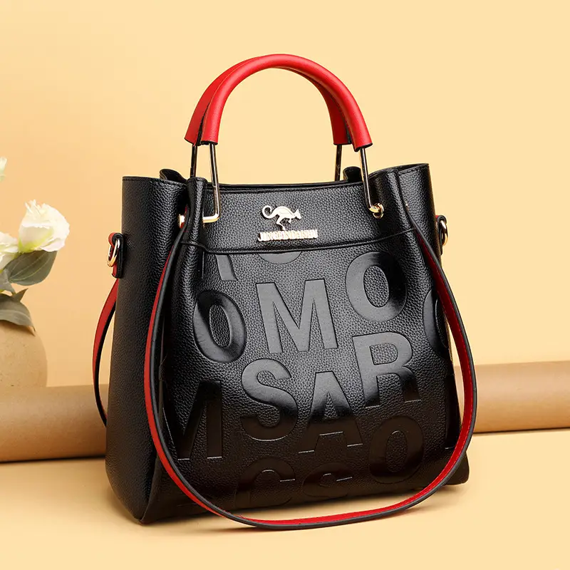 Black Embossed Shoulder Bag with Gold Silk Bow