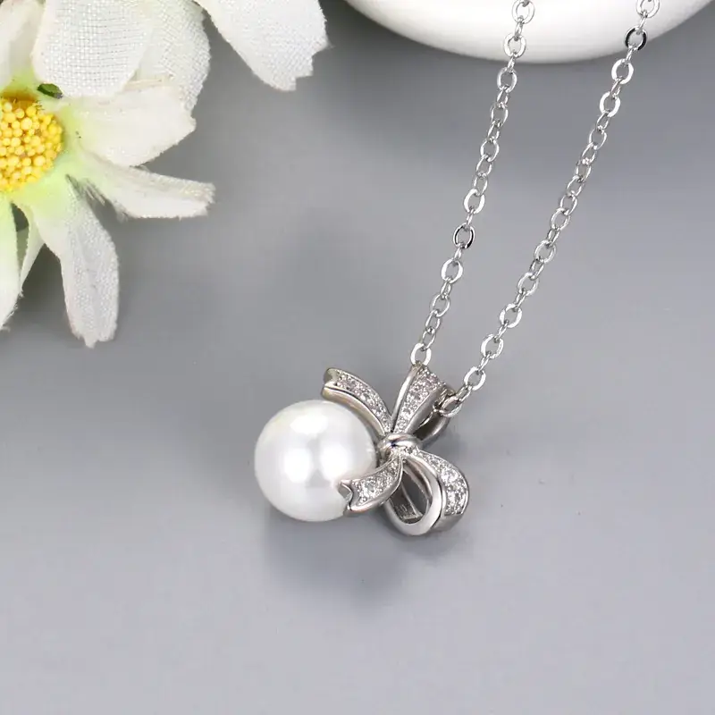 Japanese Bow Pearl Pendant Necklace Gold Zircon