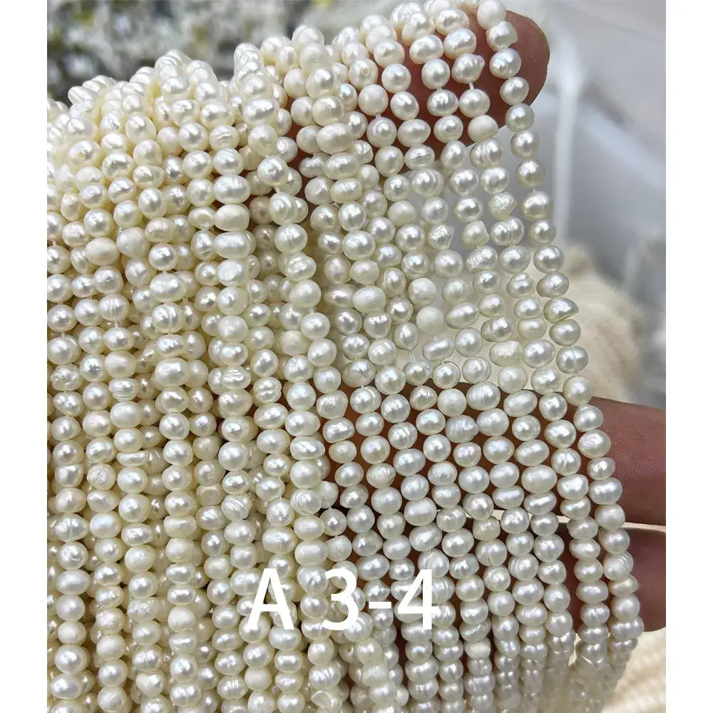 Near Round Natural Freshwater Pearl String Earrings - Image 2