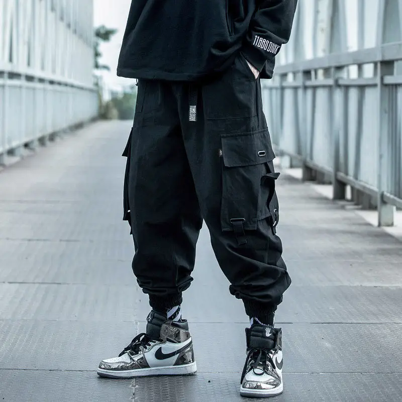 Men Black Cargo Pants with High-Tech Sneakers - Image 3