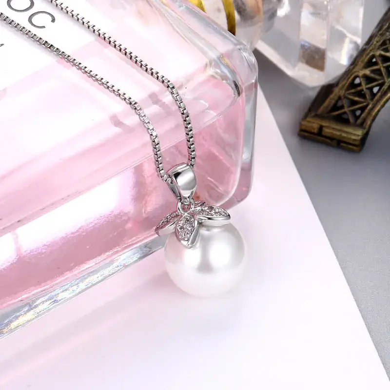 Japanese & Korean Style Pearl Pendant with Flower Charm - Image 4