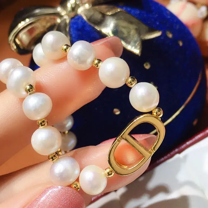 White Pearl Bracelet with Gold Plated D-Logo - Image 3