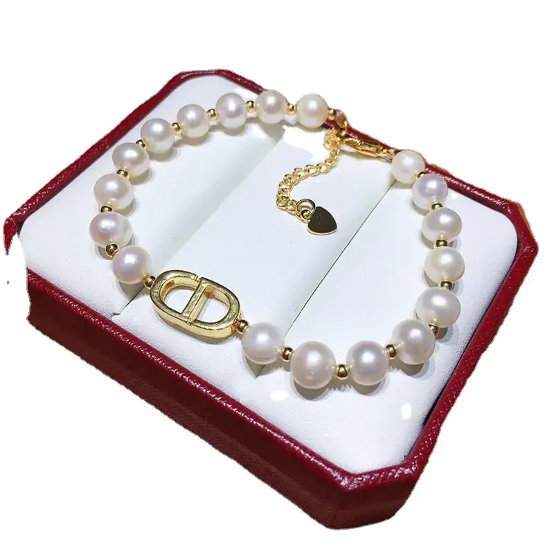 White Pearl Bracelet with Gold Plated D-Logo - Image 5
