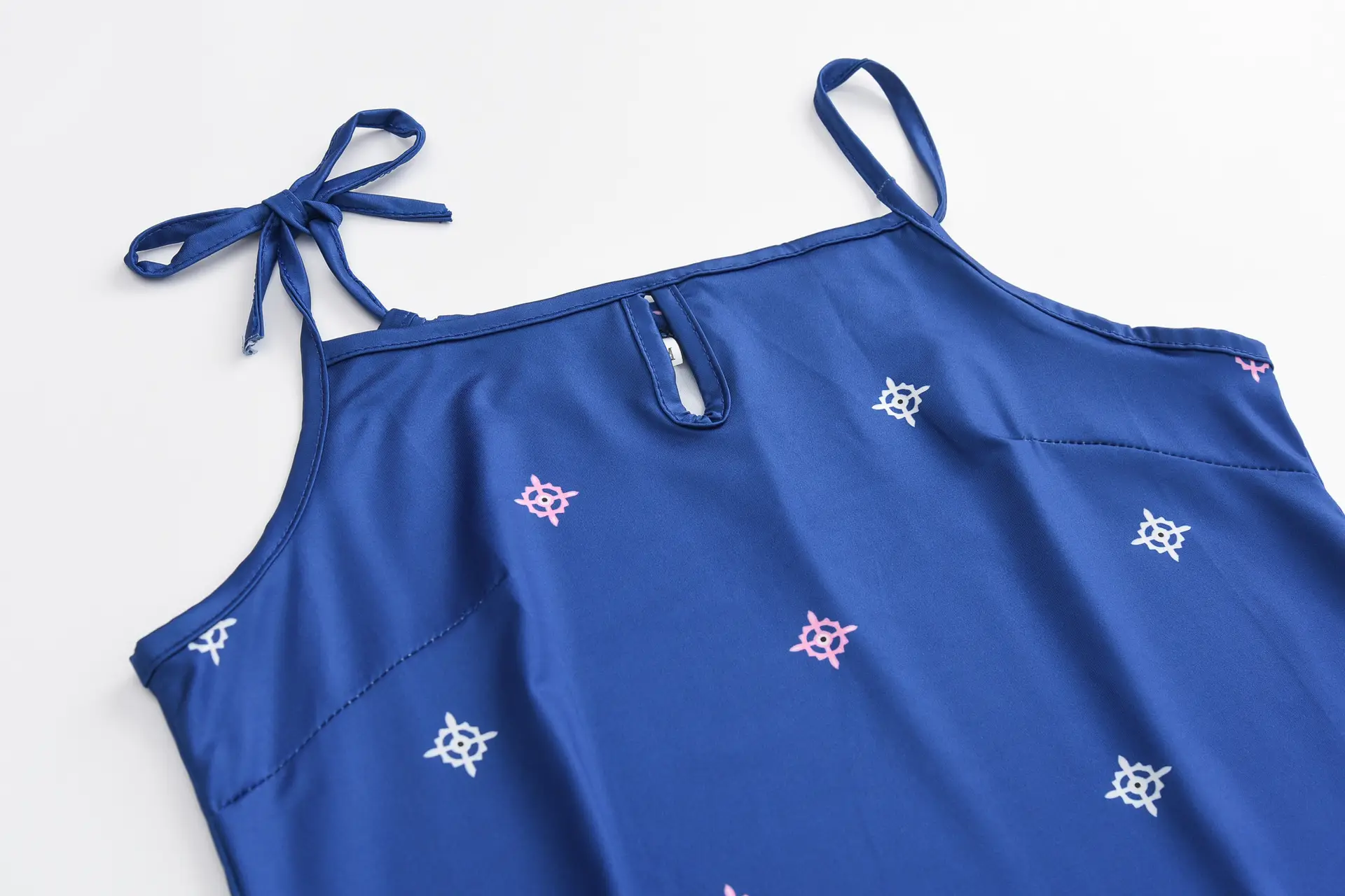 White Embroidered Sleeveless Dress with Flower Detail — feature 17
