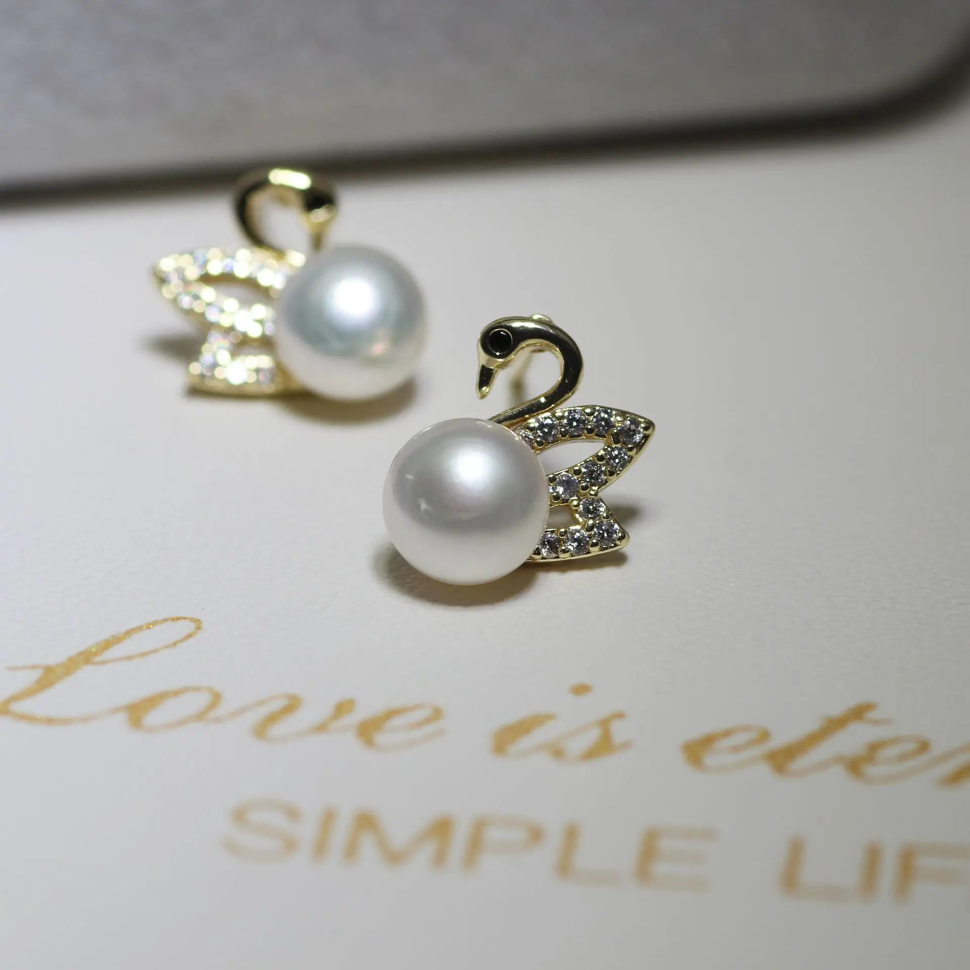 Dan Tao S925 Silver Pearl Little Swan Earrings — feature 3