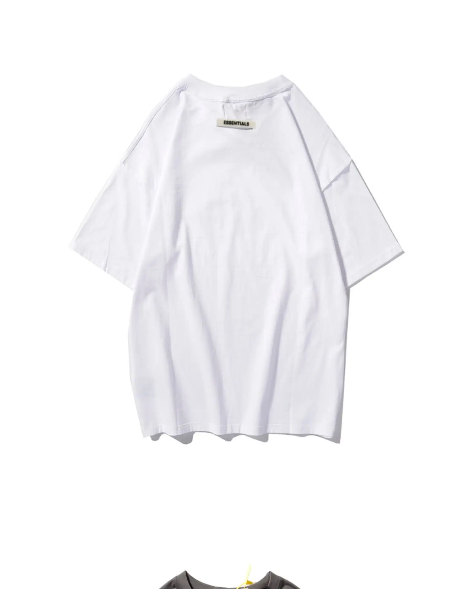White Loose Fit T-Shirt with "Essentials" Print — feature 14