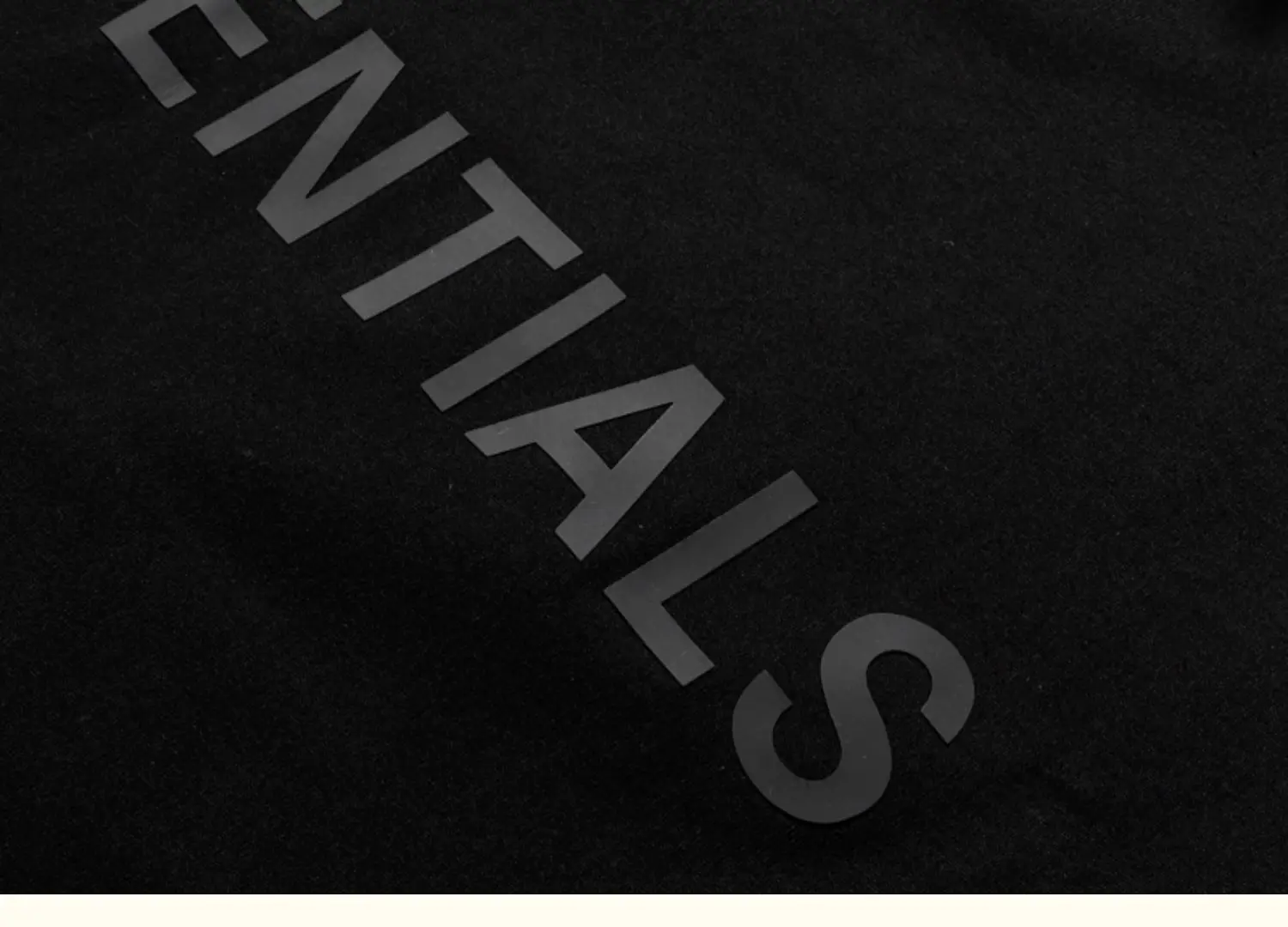 White Loose Fit T-Shirt with "Essentials" Print — feature 23