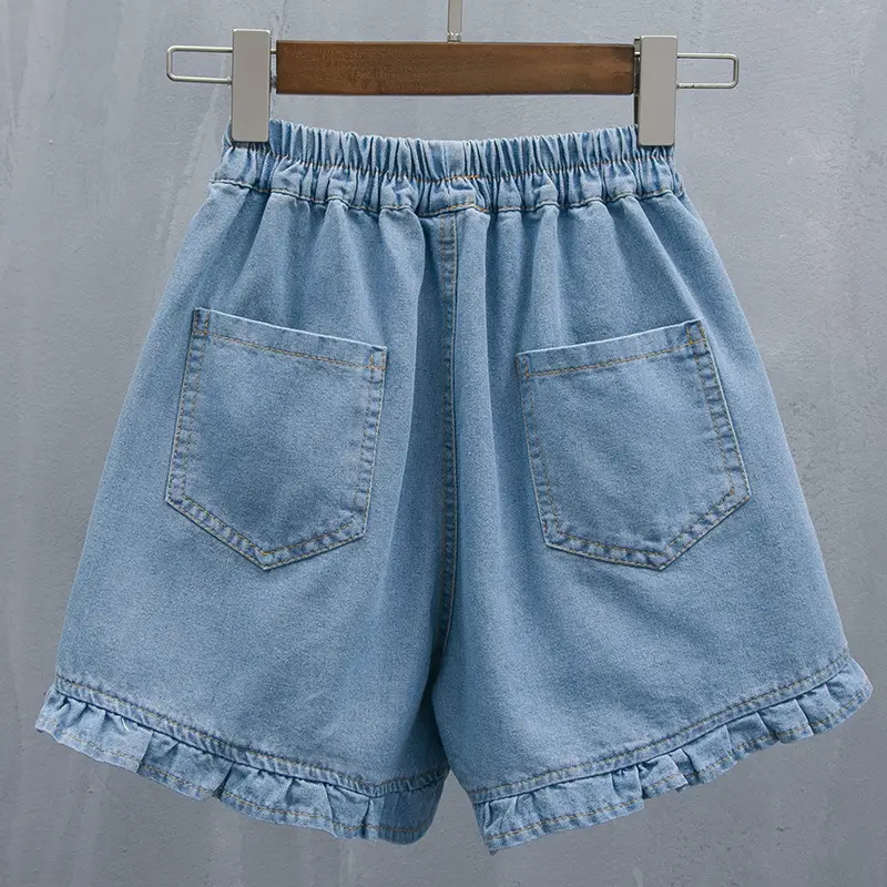 Light Blue Denim Shorts with Elastic Waist & Ruffled Hem - Image 3