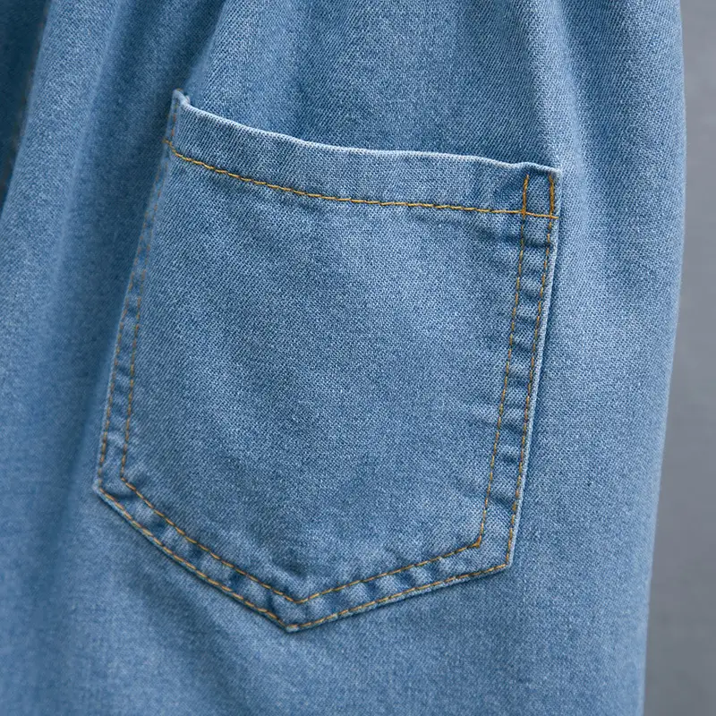 Light Blue Denim Shorts with Elastic Waist & Ruffled Hem - Image 4
