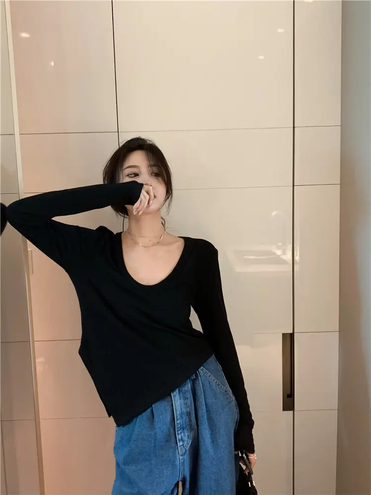 帮手描述图:不规则白色修身长袖T恤女2021春秋新款设计感紧