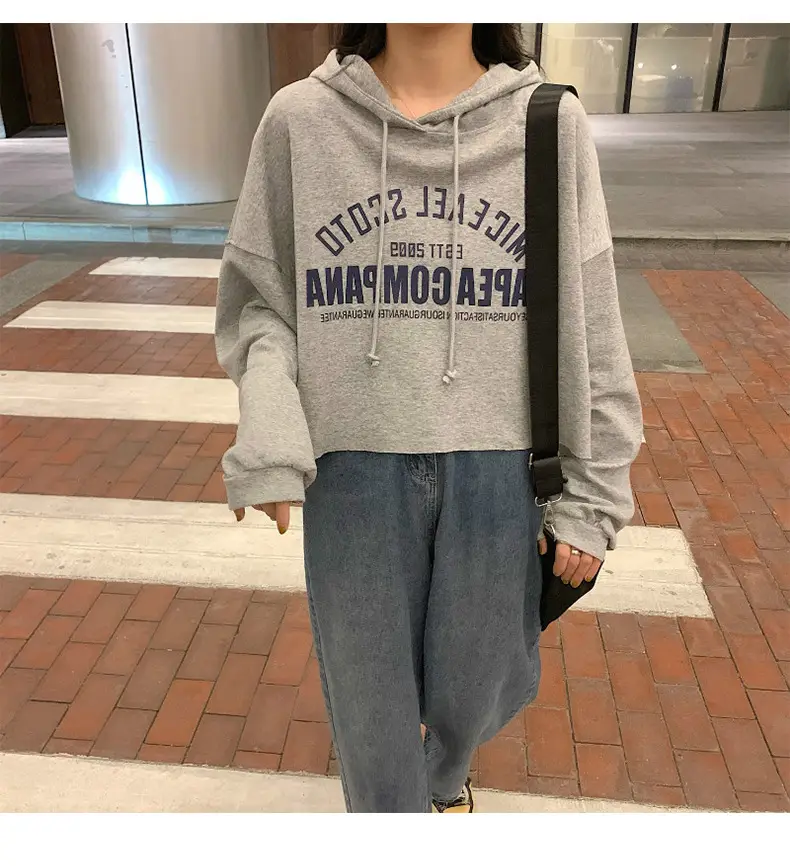Women White Cotton Hoodie with "We Are Not Going" Print — feature 10