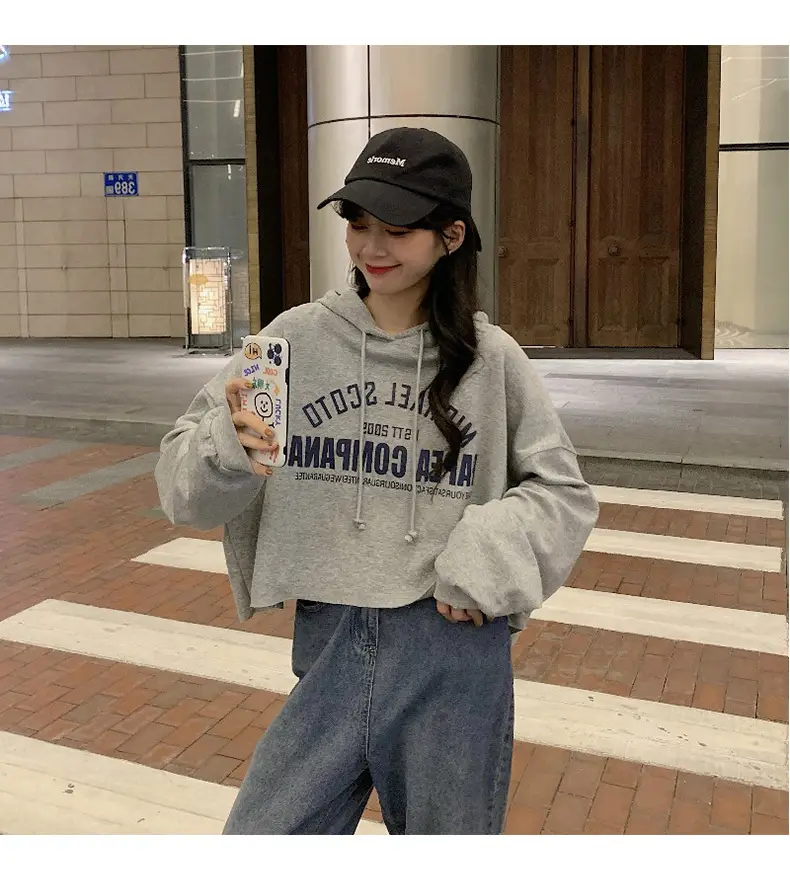 Women White Cotton Hoodie with "We Are Not Going" Print — feature 7