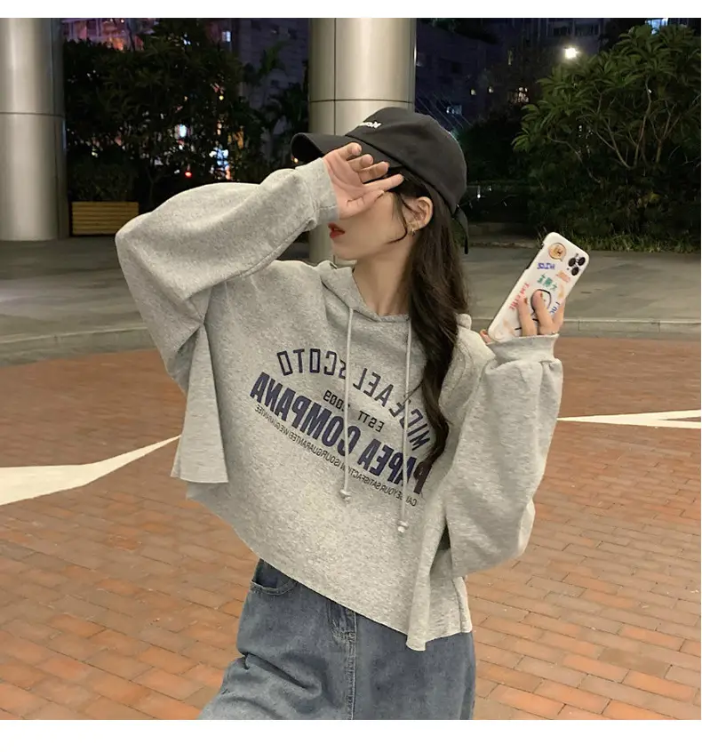 Women White Cotton Hoodie with "We Are Not Going" Print — feature 9