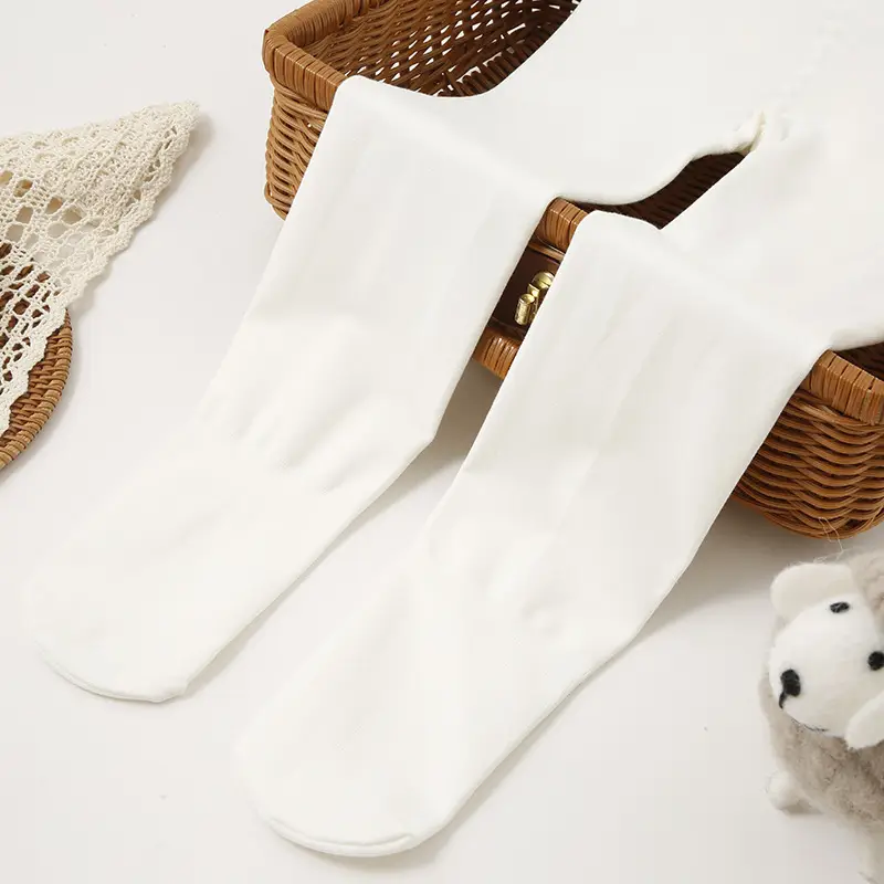 Wholesale children's autumn and winter fleece-lined thickened pantyhose generation hair girls dancing dragon claw hair white ballet dance socks