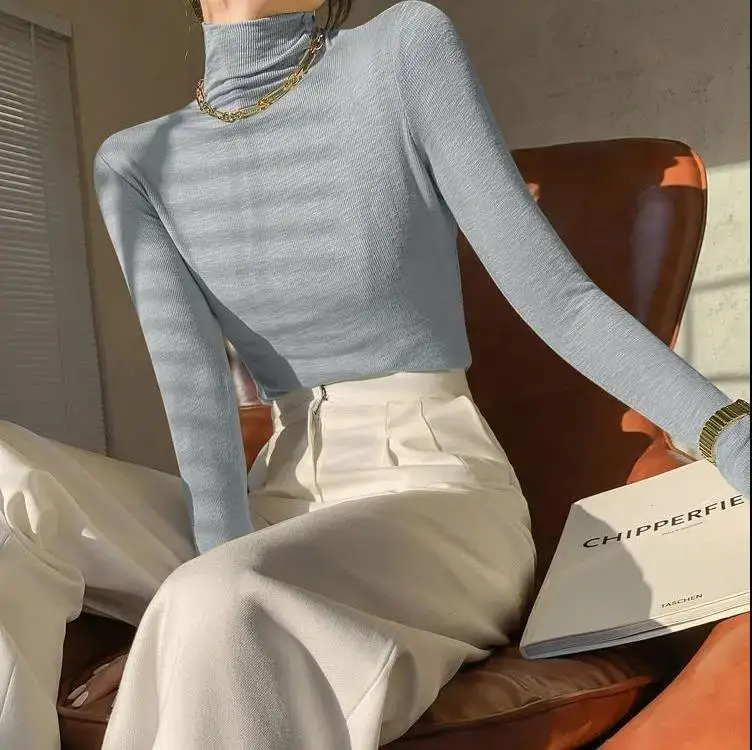 Women Black Long Sleeve Turtleneck Top with White Pants