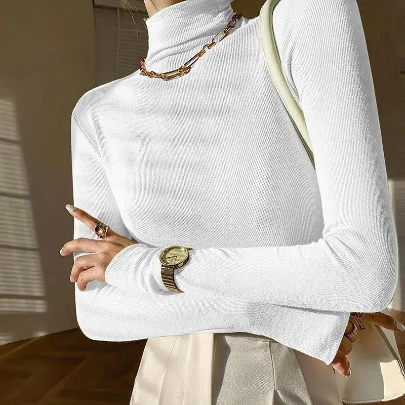 Women Black Long Sleeve Turtleneck Top with White Pants