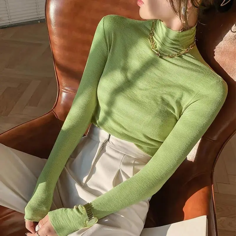 Women Black Long Sleeve Turtleneck Top with White Pants