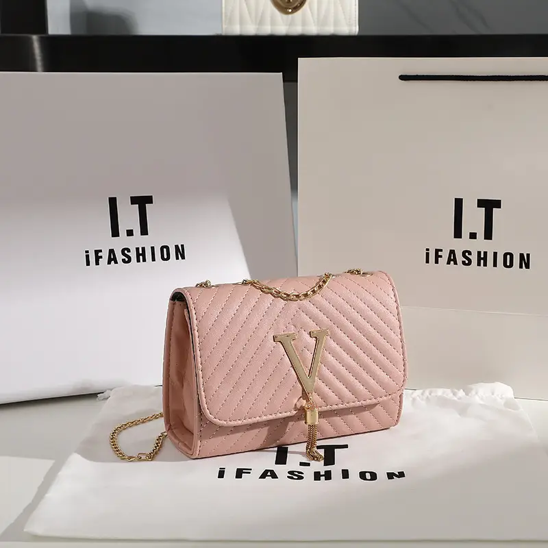 White Quilted LV Style Shoulder Bag with Tassel Decor - Image 6